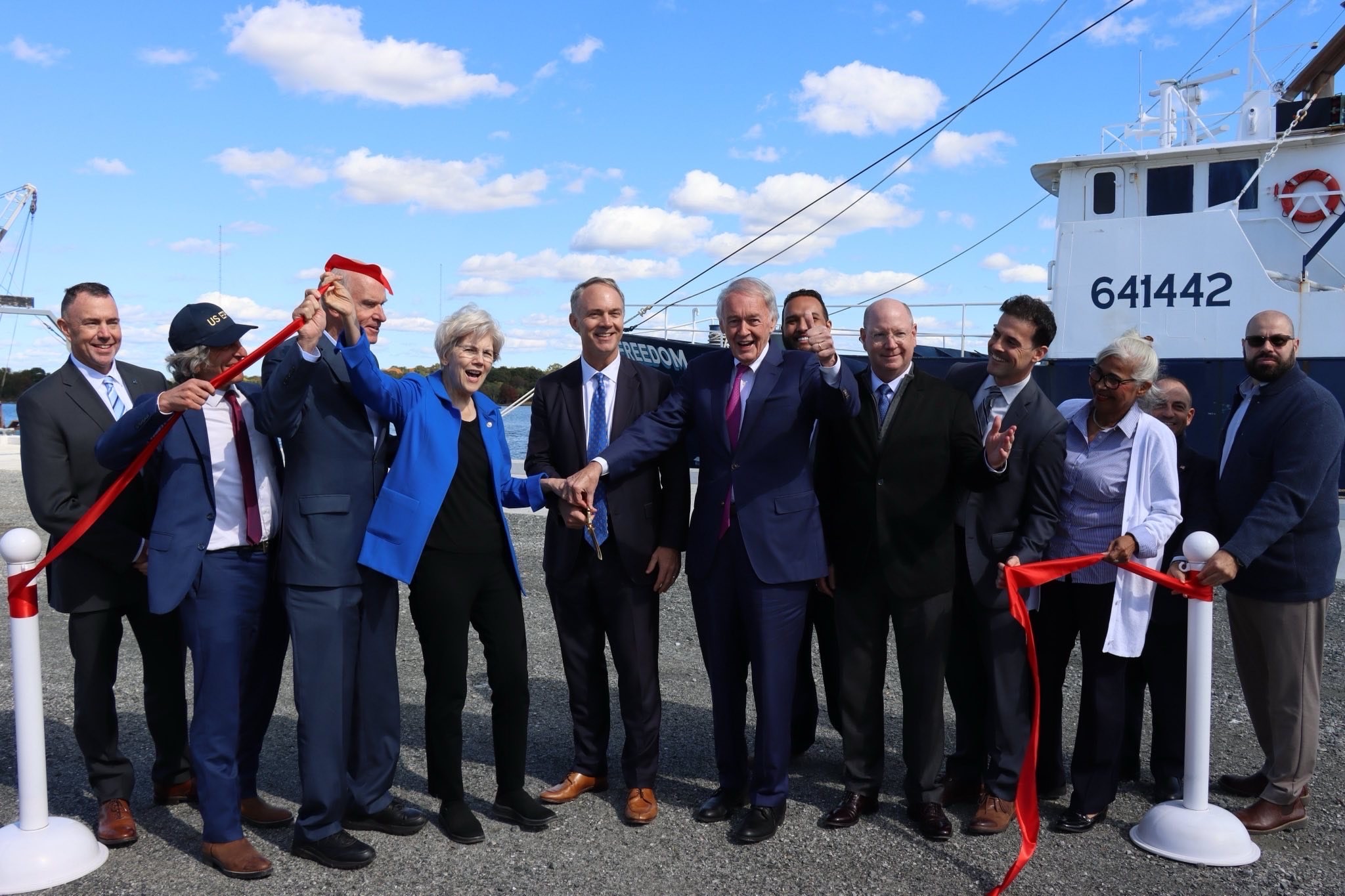 Sen. Markey, Sen. Warren, Rep. Keating, Mayor Mitchell and other officials cutting the ribbon at the North Terminal expansion project 